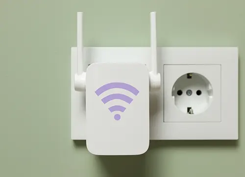Wi-Fi access point being mounted for full-home wireless coverage.